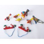 A collection of mostly Chinese and Japanese tin plate clockwork toys, mostly animals: Hero, Y,