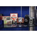 Mixed lot: a Zeiss Ikon Klio folding camera, a Brownie Reflex camera (boxed), a 'black box' Monopoly