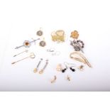 A collection of costume jewellery to include; Two rows of bloomed facetted glass beads, two
