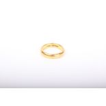 A late Victorian 22ct gold wedding band, Birmingham 1901, size R, 9.9g.