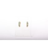 A pair of 9ct gold, emerald and diamond seven stone half-hoop earrings, convention marks, 1.2g