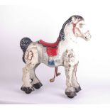 A Mobo pressed tin plate 'rock along' horse, some original paint, 74cm high