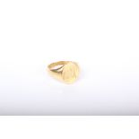 An 18ct gold oval signet ring, engraved with script initials ‘CAR()’ and inside ‘Pat’, Birmingham