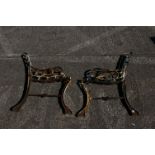 A pair of 19th century cast iron childs bench ends, ends only, 41cm wide 70cm high