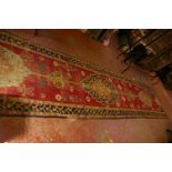 A Kurdish runner 560 x 105cm and a Beluchi rug 170 x 116cm