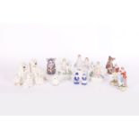 Continental figures and animal figurines, to include Royal Crown Derby koala (gold button),
