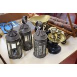 A set of three small tin lanterns each with six glazed panels (not marked), a set of pan scales with