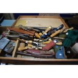 Leather working tools: a box containing specialist knives, punches, creasers, spoke shave, etc.,