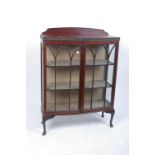 An Edwardian mahogany short bow front display cabinet, 90cm wide, 126cm high