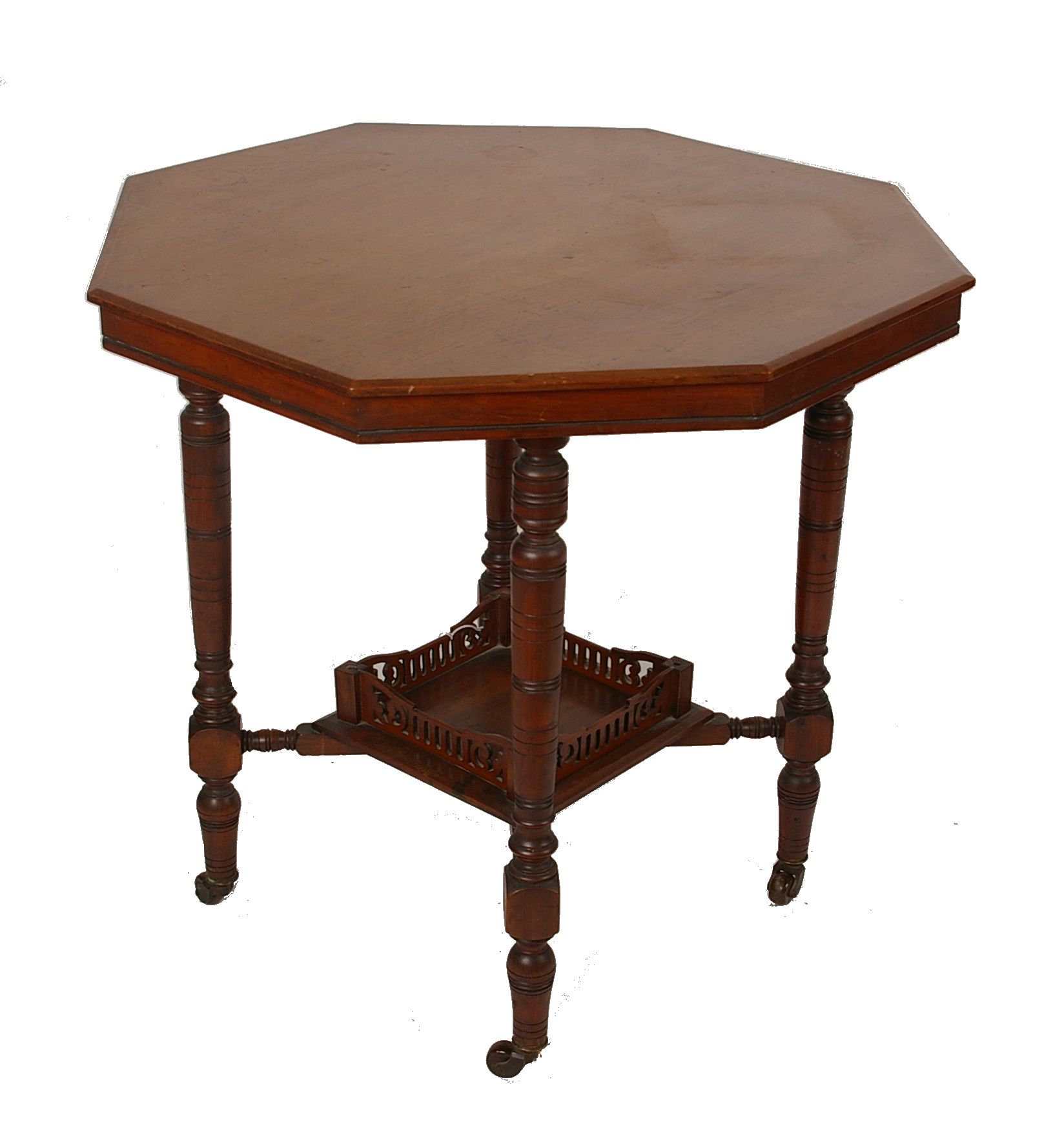 A late Victorian walnut octagonal table on turned tapering legs, 77cms diameter and a late Victorian