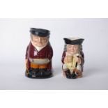 A large Royal Doulton Toby jug: The Huntsman and a medium jug: Jolly Toby