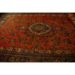 A large Persian carpet 320x 560cm