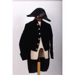 An early 20th Century court uniform comprising deep blue velvet tailcoat, britches, waistcoat,