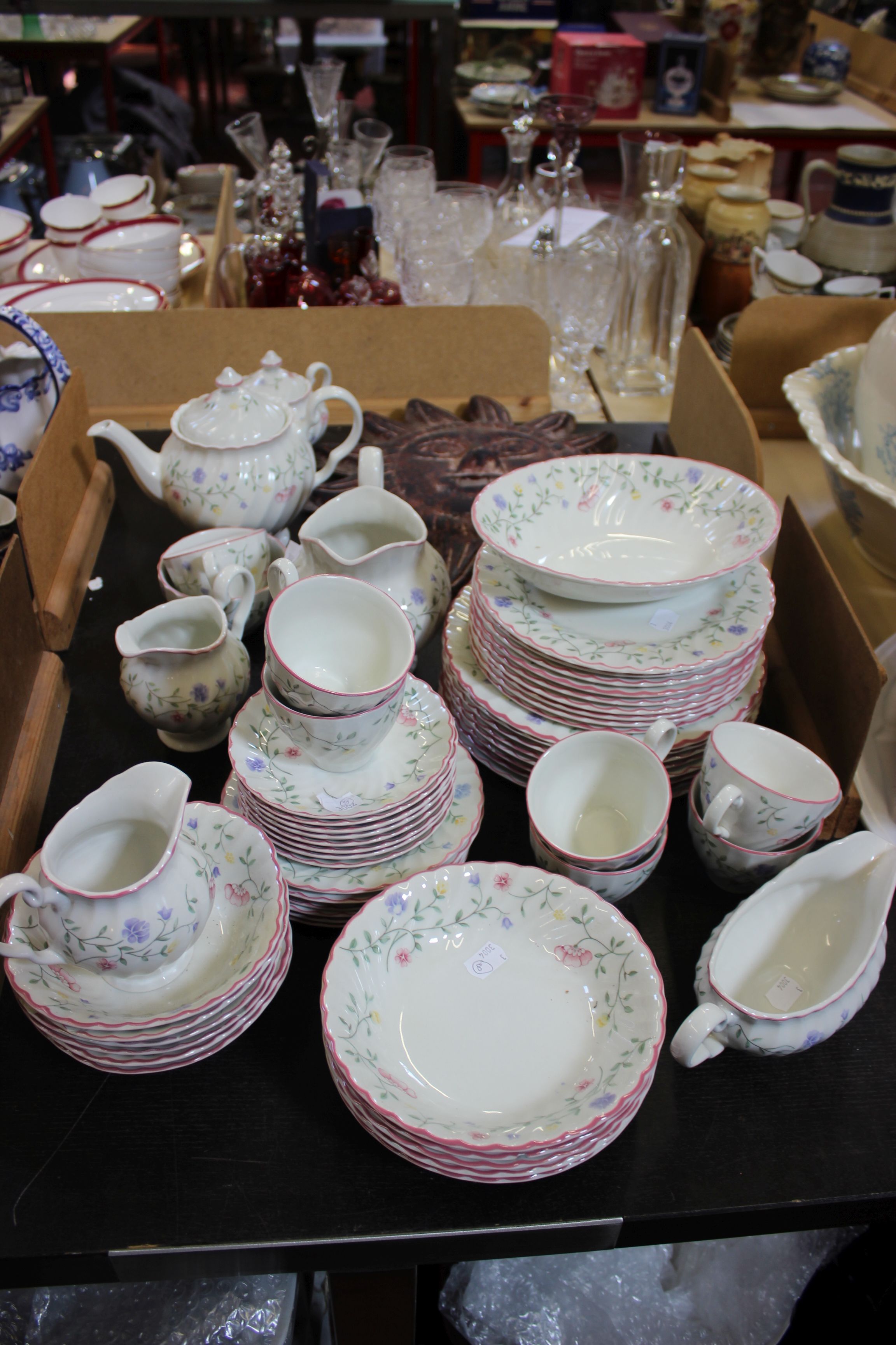 A Johnson Brothers floral pattern table service with pink rim (60 pieces) and a pottery 'Sun Face' - Image 2 of 2