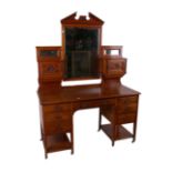 An Edwardian mahogany mirror back dressing table 130cm wide