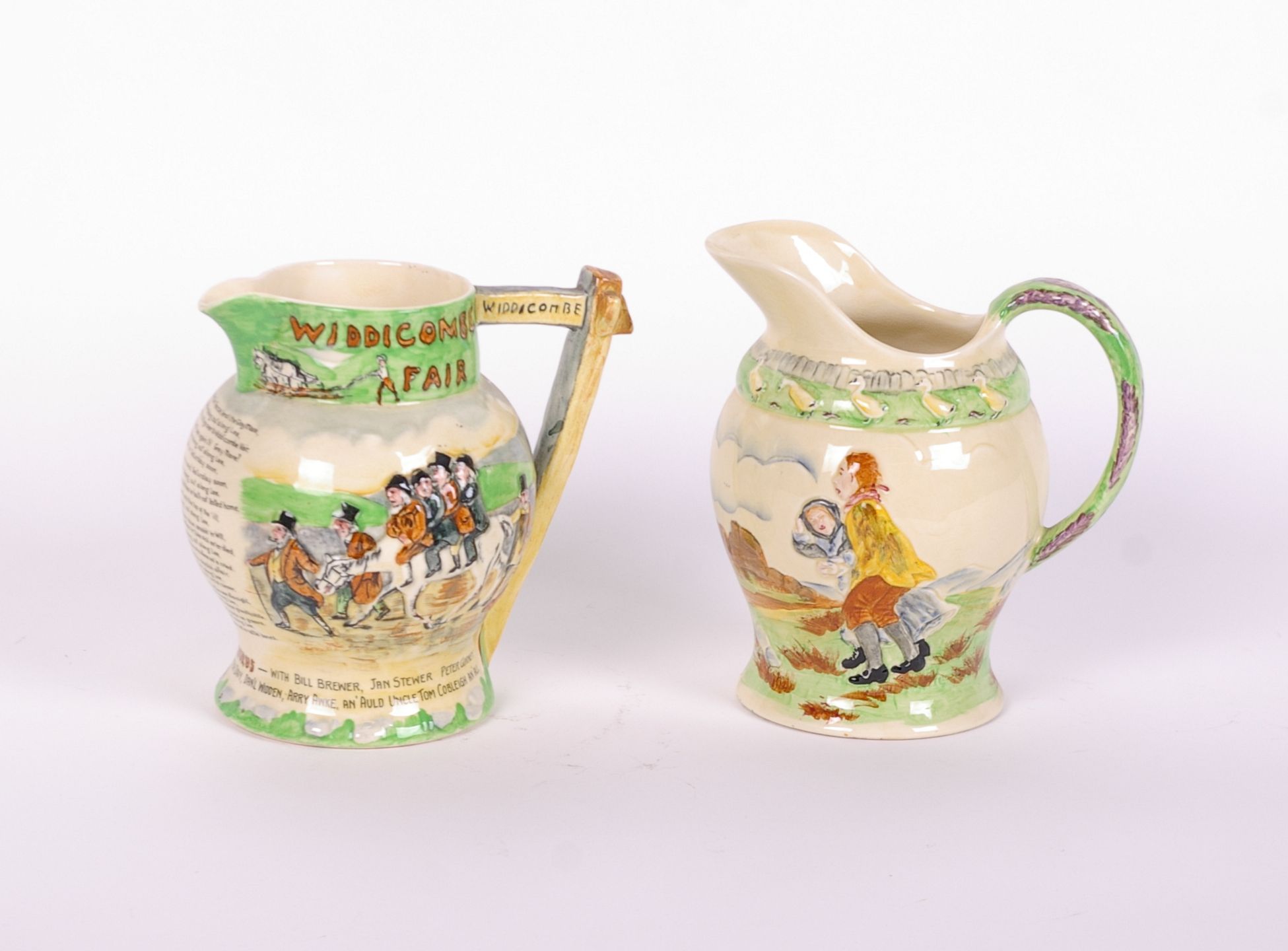 Two Crown Devon musical jugs: 'Widecombe Fair' and 'on Ilkley Moor Baht'at', both in working
