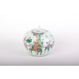A 19th century famille verte lidded vase decorated with figures on horseback in a procession