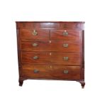 An early 19th century inlaid mahogany Scottish type chest of five drawers below a secret drawer with