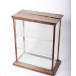 A Victorian counter top glazed display cabinet in need of restoration, 57cm wide, 70cm high