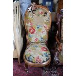 A tapestry covered Victorian nursing chair (broken top intact and attached for repair)