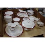 A Worcester cerise rim table service (58 pieces) and a similar tureen