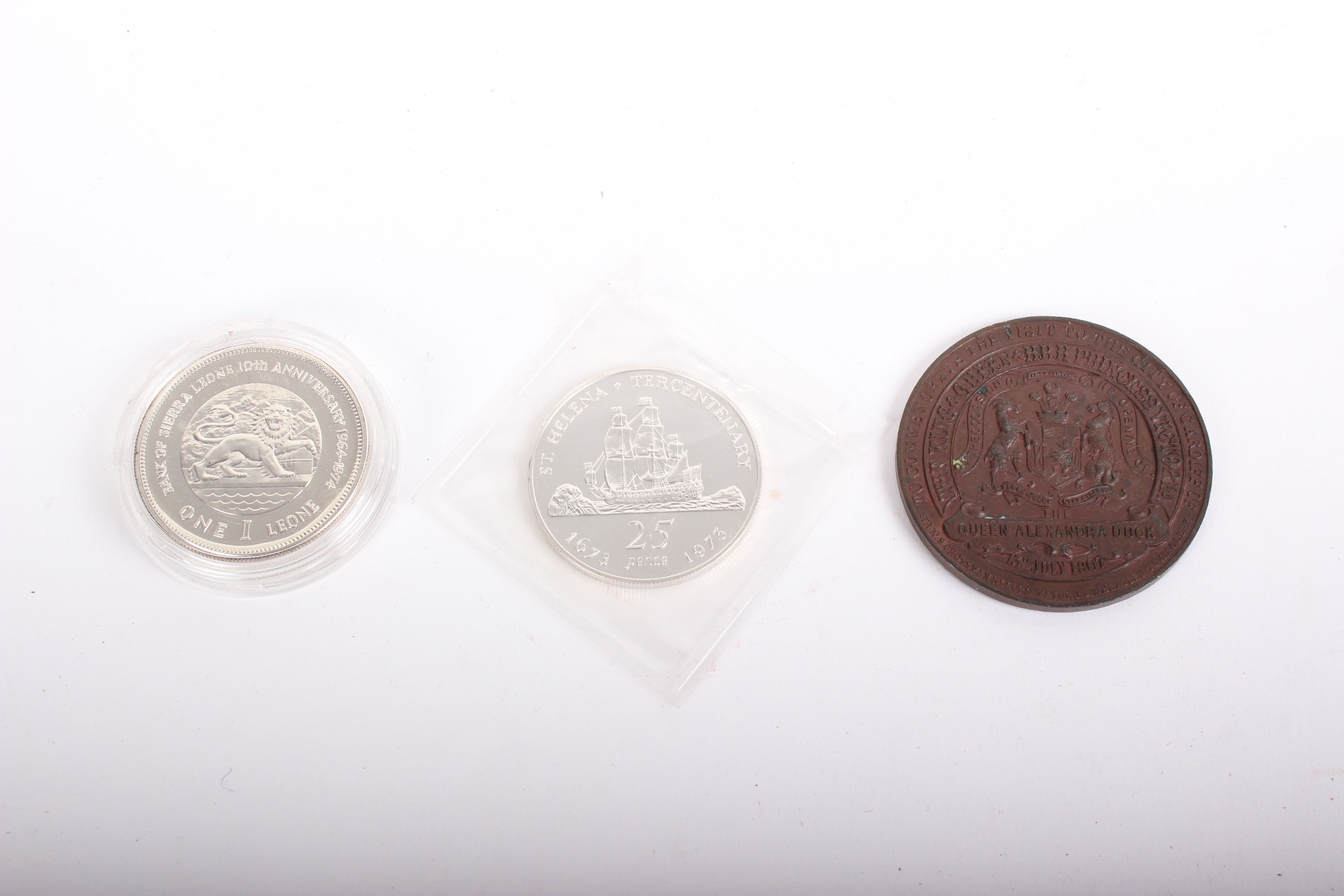 Two proof silver coins (St Helena and Sierra Leone) Royal Mint, both boxed; and a 1907 Cardiff Royal