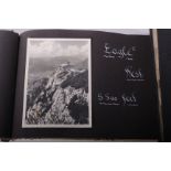 A small souvenir photograph album containing 20 black and white prints of 'Hitlers home and Eagles