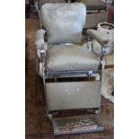 A set of three mid 20th Century chromed and upholstered barbers chairs bearing mark 'Hovenden &