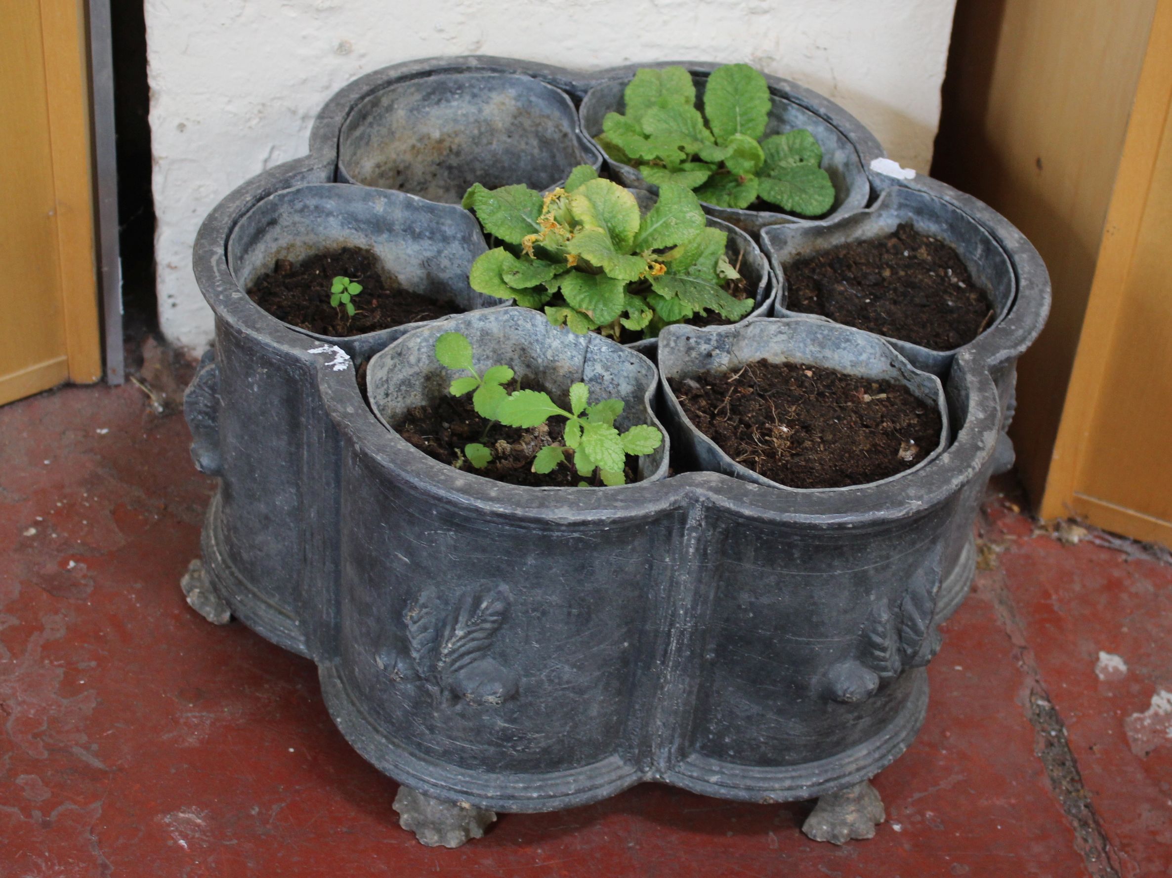 A Georgian style lead planter of sectional form, with six individual compartments on paw feet - Image 2 of 3