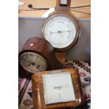 Three aneroid barometers and a 1940's mantel clock