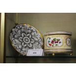 A Fornasetti plate, 20th century, 26cm diameter; and a modern English porcelain bough pot,