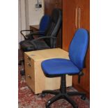 Three office chairs and a lockable three drawer pedestal