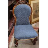 A Victorian mahogany framed and upholstered nursing chair