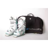 A pair of Salomon X-Pro 90w ski boots (size 23), with a Lange boot bag.Provenance: from the estate