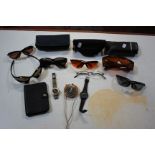 Assorted personal items, to include six pairs of sunglasses (Blublocker and Oakley), Ingersoll