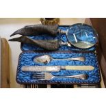 A Victorian boxed three piece cutlery set, engraved silver plate, other cutlery, two other