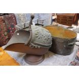 A large Victorian oval copper boiling pan with twin handles (70cm wide), a Victorian copper coal