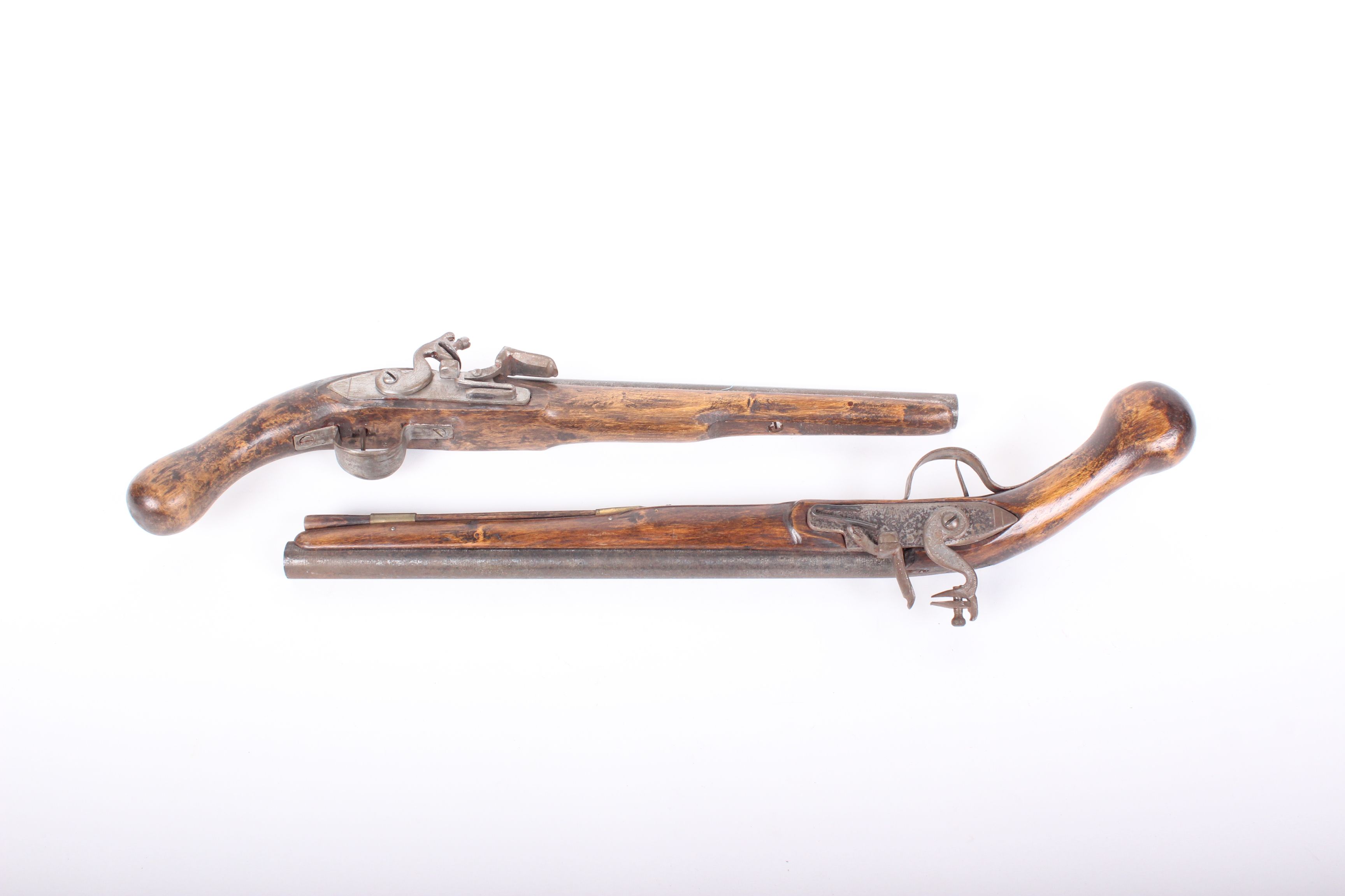 Two very similar reproduction 18th century style flint lock pistols52cm long