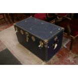 Two vintage travelling trunks, together with some household linen, a pair of gilt picture frames,
