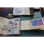 Box of stamps in envelopes with a series of small duplicate books. mostly pre 1955 with modest