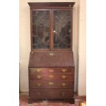A late George III mahogany bureau bookcase, fitted interior and astragal glazed top, 91cm wide,