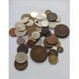 A large collection of coins to include a near complete album 'Pennies of Great Britain 1902-67' a