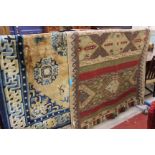 A Chinese rug 190 x 120cm and a modern woollen rug