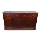 A late Victorian mahogany sideboard, two short drawers over four cupboard doors on plinth base.