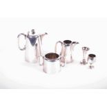 A three piece Walker & Hall Sheffield plate tea set together with two silver plated footed cups.