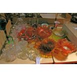 A collection of glassware to include two Caithness vases a quantity of carnival glass and numerous