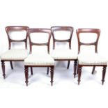 A set of four Victorian oak balloon back dining chairs together with a pair of Sheraton style oak