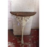 A marble topped console table.