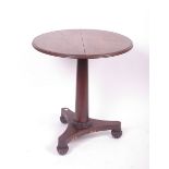 A 19th Century mahogany circular occasional table, column support on tripod base and carved feet.