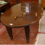 An early 20th Century mahogany dining table on square tapering reeded legs 175cm length
